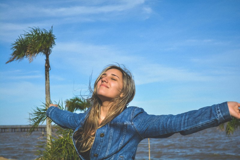 woman feeling the air